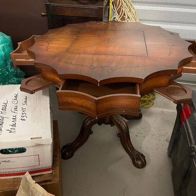Vintage game table. Solid wood with drawers and pull out drink holders.  36â€ round table.