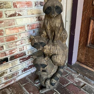Adorable Outdoor Statue of Three Raccoons