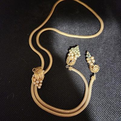 Gold necklace with clip
