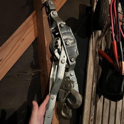 Large Lot of Chains, Metal Cables, Hooks, and Pulley of Varying Sizes and Lengths
