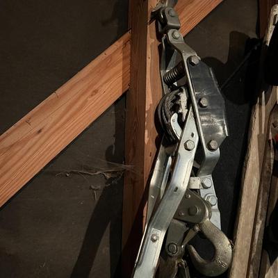 Large Lot of Chains, Metal Cables, Hooks, and Pulley of Varying Sizes and Lengths
