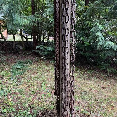 Large Lot of Chains, Metal Cables, Hooks, and Pulley of Varying Sizes and Lengths