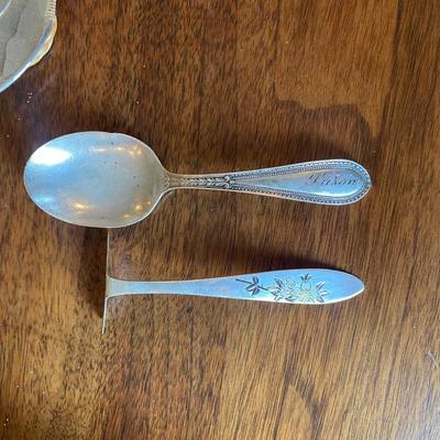 sterling baby food pusher and baby spoon.