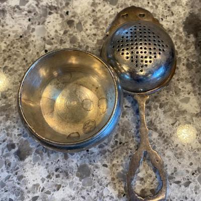 silverplate tea strainer with bowl.