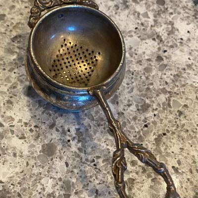 silverplate tea strainer with bowl.