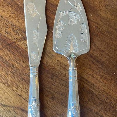 silver plate cake knife and server.