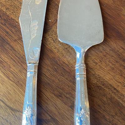silver plate cake knife and server.
