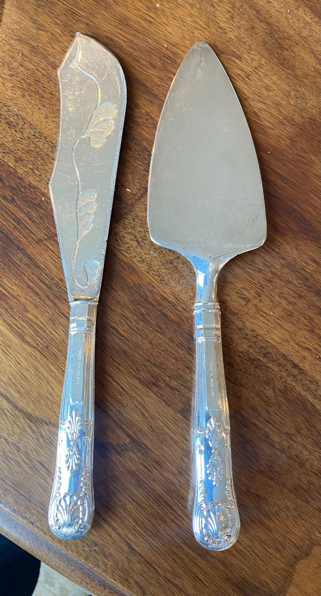 silver plate cake knife and server.