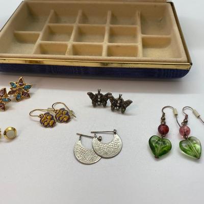 Lot 9: Jewelry box full of pierced earrings