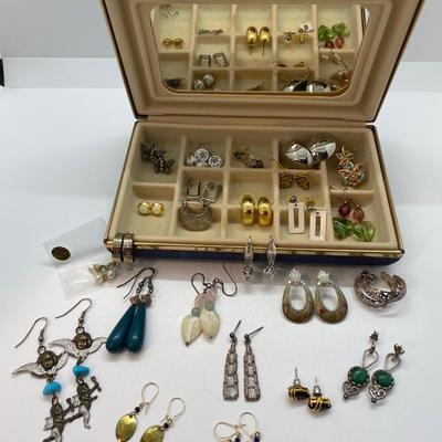 Lot 9: Jewelry box full of pierced earrings
