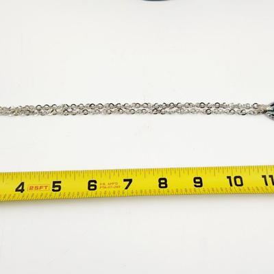 FUN SILVER TONED NECKLACE WITH BLUE/BLACK PENDANT