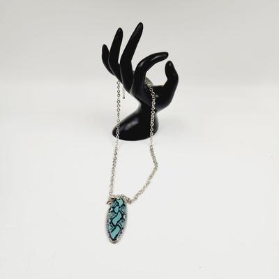 FUN SILVER TONED NECKLACE WITH BLUE/BLACK PENDANT