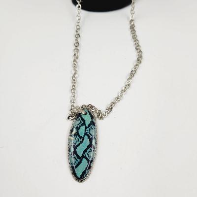 FUN SILVER TONED NECKLACE WITH BLUE/BLACK PENDANT