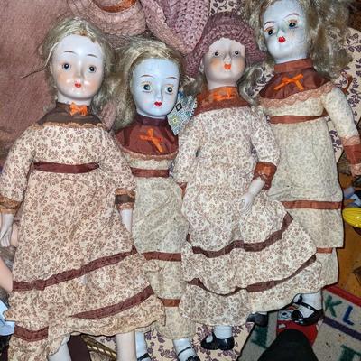 Lot of 4 Bisque Cloth Body Dolls