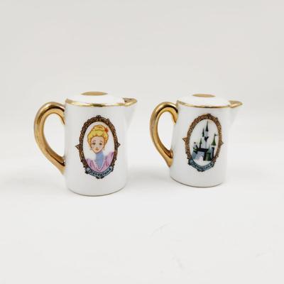 VINTAGE DISNEY CASTLE - OFFICER - PRINCESS SALT & PEPPER SHAKER PITCHERS