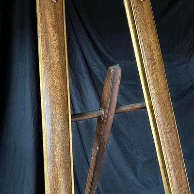 Baroque style wooden easel with gold color details