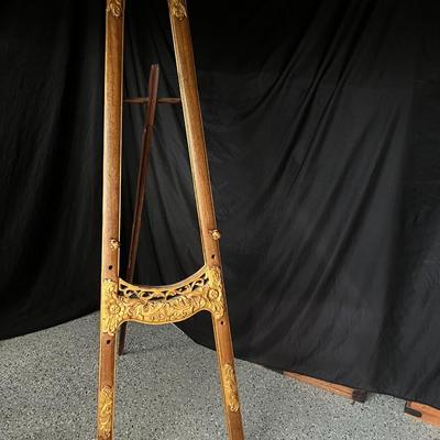Baroque style wooden easel with gold color details