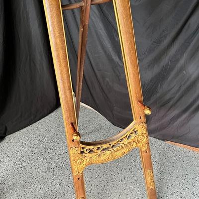 Baroque style wooden easel with gold color details