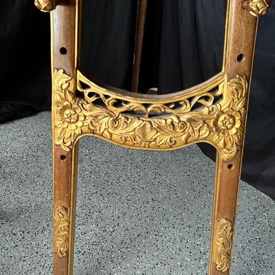Baroque style wooden easel with gold color details