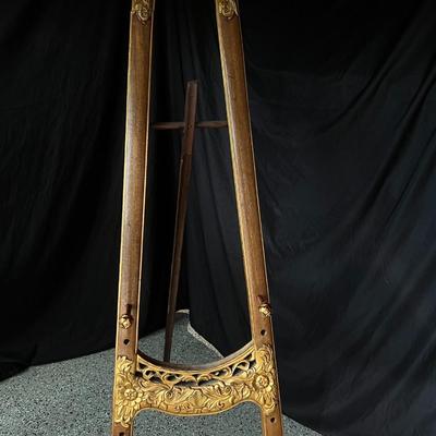 Baroque style wooden easel with gold color details