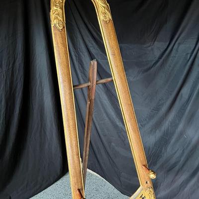 Baroque style wooden easel with gold color details