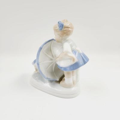 VINTAGE PORCELAIN GIRL WITH GOOSE FIGURINE