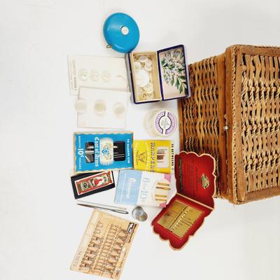 VINTAGE ARRAY OF SEWING SUPPLIES WITH WICKER BASKET