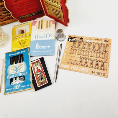 VINTAGE ARRAY OF SEWING SUPPLIES WITH WICKER BASKET