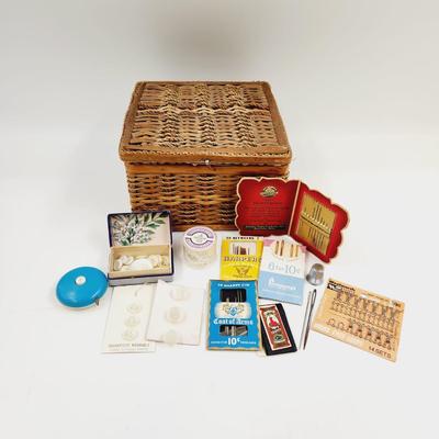 VINTAGE ARRAY OF SEWING SUPPLIES WITH WICKER BASKET
