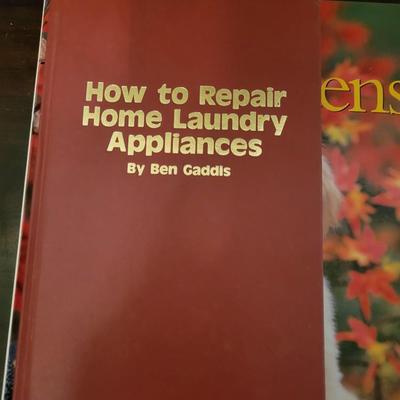 Books- reader;s digest 4 titles,  one about appliance repair and golden retrievers
