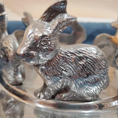 Silver tone candle holder with rabbits