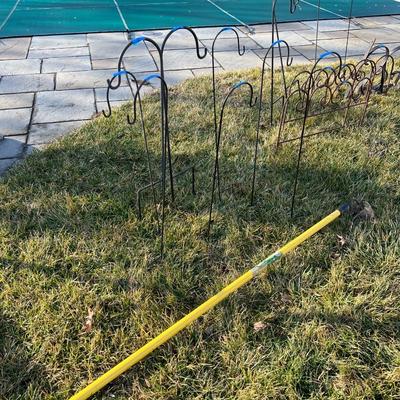 Lot of 9: 8 shepherd hooks, and one hoe