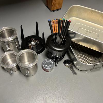 Lot: 1 Fondue Set, 1 fondue base w/ parts, 3 stainless kitchen canisters, 1 roasterpan with lid