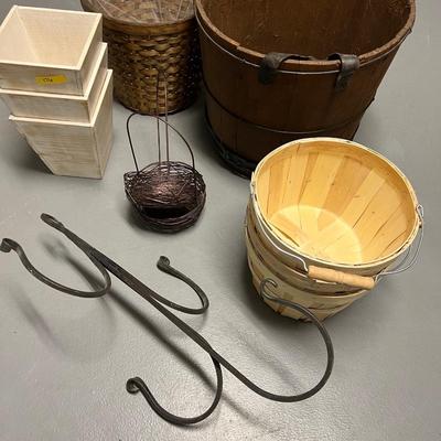 Lot of 11: 1 Decorative Hook, 1 Wicker Planter, 1 wooden basket w/ leather straps, 2 small wire baskets, 3 wooden planters, 3 woven...