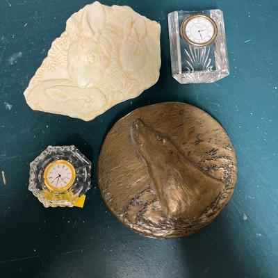 Lot of 4: 2 Waterford crystal clocks, 1 cast bronze seal head from the Wild Goose Studio Ireland, & 1 Rabbit Plaque