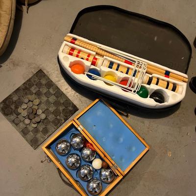 Lot of 3: 1. Slate Checkers Set; 2. Croquet set with carrying case; 3. 7 metal bocce balls in wooden carrying case. 