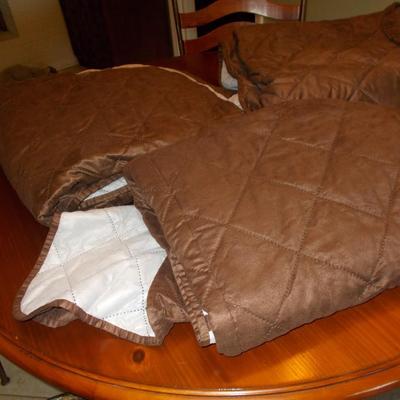 Three Brown Quilted Furniture Covers