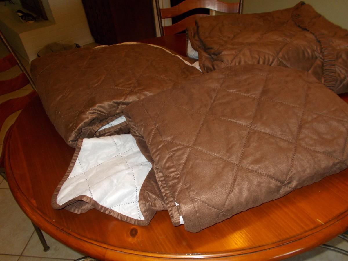 Three Brown Quilted Furniture Covers