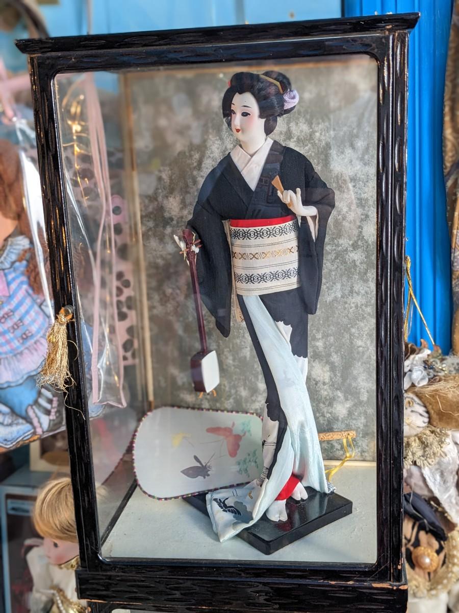 Vintage geisha doll in glass case sales