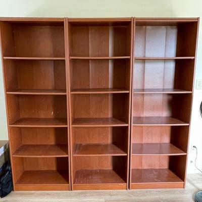 LOT 77  SET OF THREE WOODEN BOOK CASES ADJUSTABLE SHELVES