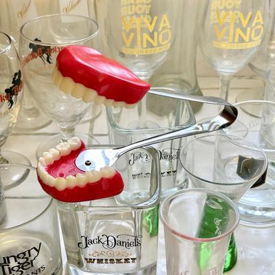 LOT 95  NOVELTY GROUP OF BAR WARE ASSORTED BRANDED GLASSES FALSE TEETH ICE TONGS