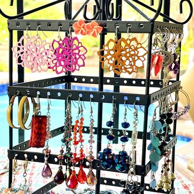LOT 106  REVOLVING JEWELRY STAND WITH COSTUME JEWELRY PIERCED EARRINGS