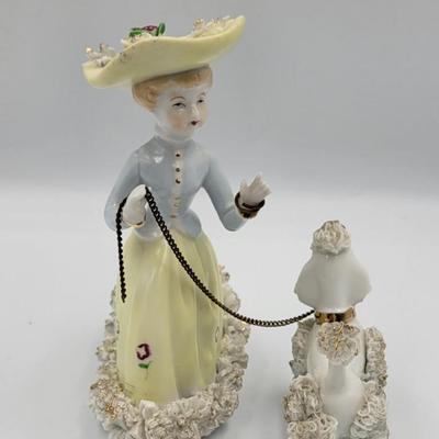 Antique Lady Walking Dag Figurine