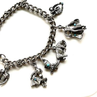 LOT 123  COSTUME JEWELRY SILVER TONE METAL CHARM BRACELET BULL FIGHTER THEME
