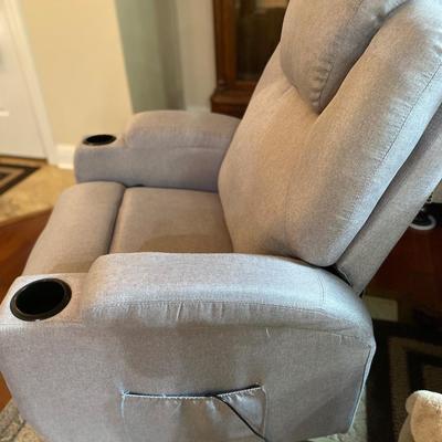 Gray fabric upholstered rocker recliner