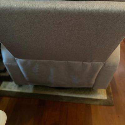 Gray fabric upholstered rocker recliner