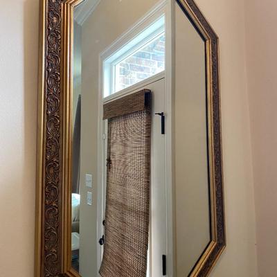 Octagonal mirror with floral gold resin frame