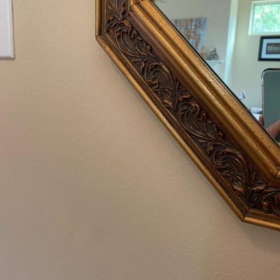Octagonal mirror with floral gold resin frame