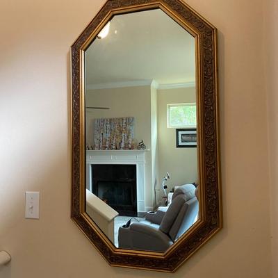 Octagonal mirror with floral gold resin frame