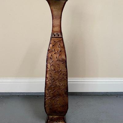 Tall metal vase